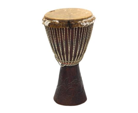 An African tribal drum, with animal skin to top, 62cm high. 