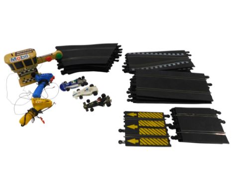 A Scalextric slot car racing set, with track.