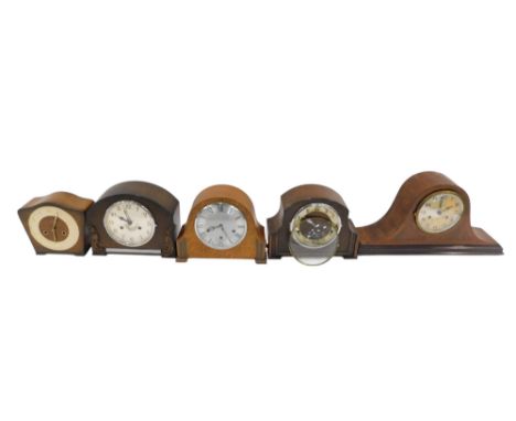 A group of mantel clocks, to include an early 20thC mahogany and boxwood inlaid Napoleon hat mantel clock, the circular silve