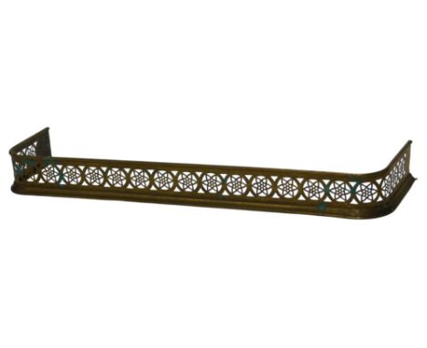 V A Victorian pierced brass fender, 122cm wide. 