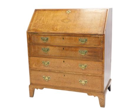 A 19thC oak and mahogany crossbanded bureau, fall inlaid with a vase, above an arrangement of four graduated drawers, on brac