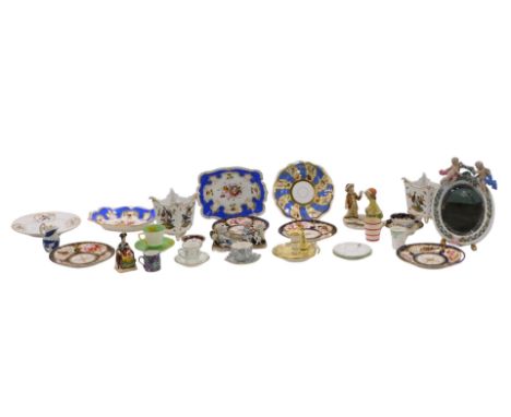 A pair of Dresden porcelain square jardinieres, decorated with birds, a German porcelain mirror, applied with putti, a pair o