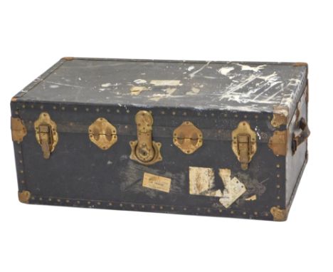 A canvas and metal bound travelling trunk, 86cm wide.