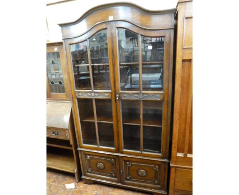 Mid 20thC oak arch top glazed bookcase 