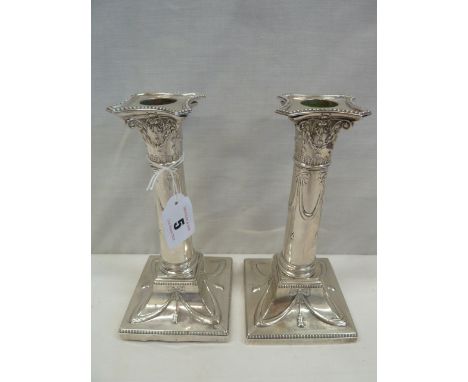 Pair filled silver column candlesticks decorated with swags - London 1901 