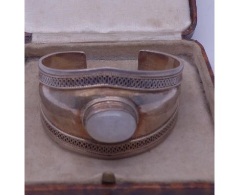 SILVER Ladies bangle, marked 925 set with Moonstone, 