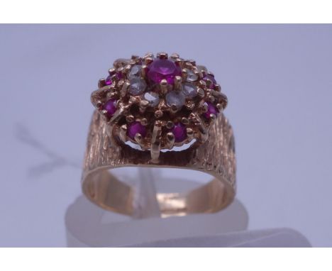 Good quality 9ct GOLD ladies cocktail ring, 5.5 grams, set with ruby and diamond chips to the top, size k makers mark EG est