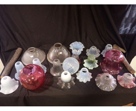 A LARGE QUANITY OF VARIOUS GLASS LAMP SHADES 