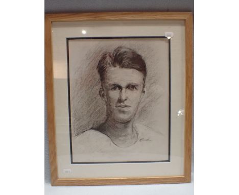 A BLACK CHALK PORTRAIT OF T. E. LAWRENCE signed 'Burden'