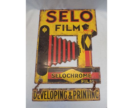 A 'SELO FILM' PHOTOGRAPHY  'SELOCHROME FILM'  ENAMEL ADVERTISING SIGN double sided, of Art deco cut-out design, with pendant 