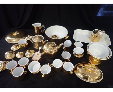 A ROYAL WORCESTER PART TEA SERVICE and a similar Royal Worcester part  service (a lot)