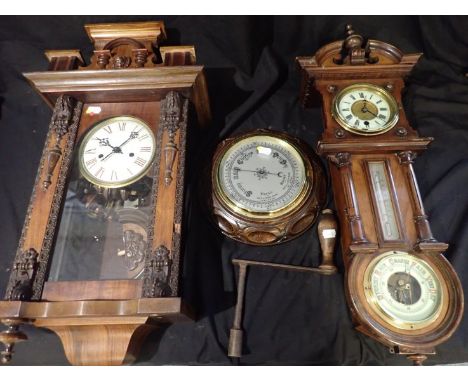 A VICTORIAN MAHOGANY WALL CLOCK the white enamel dial with black Roman numerals and dark black steel hands; a mahogany wall c