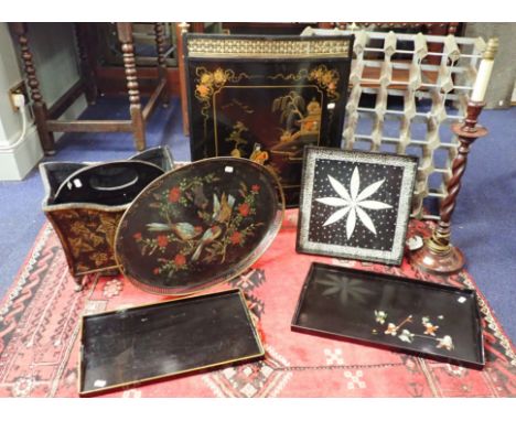 A COLLECTION OF LACQUER TRAYS with a lacquer style fireguard, a magazine basket, a candlestick style oak lamp and a wine rack