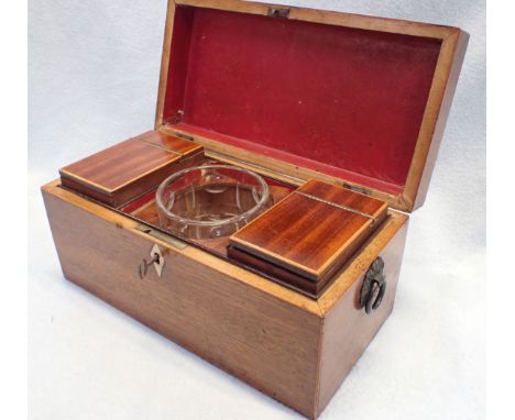 A 19TH CENTURY MAHOGANY TEA CADDY, WITH FITTED INTERIOR glass bowl, and pressed metal handles 30cm wide