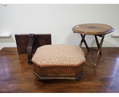 A SMALL VICTORIAN STOOL with hinged lid, on ebonised feet, 15cm high, together with a small folding table, and a mahogany wal