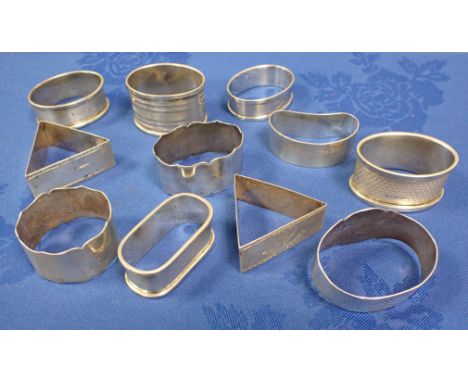 A COLLECTION OF MASONIC SILVER NAPKIN RINGS including an example from Sincerity Lodge T S, Birmingham, 1909, with engine-turn