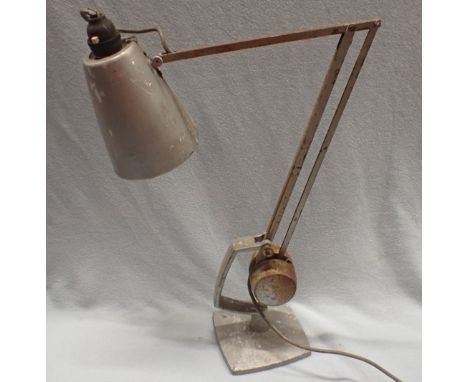 AN ADJUSTABLE  COUNTERBALANCED DESK LAMP BY HADRILL &amp; HORSTMANN 