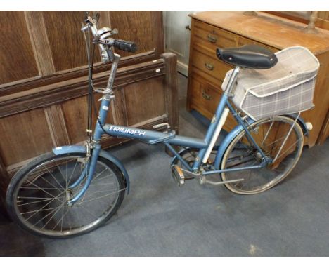 A  VINTAGE RALEIGH TRIUMPH FOLDING BICYCLE 