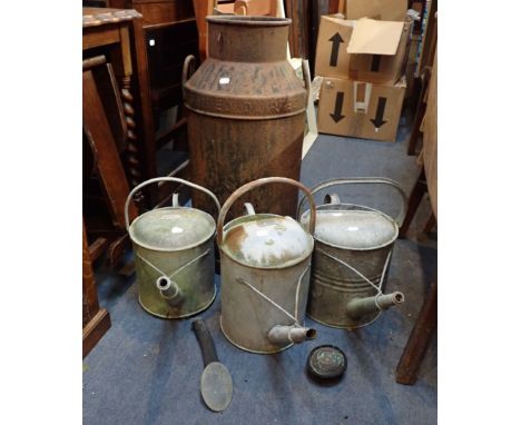 THREE VINTAGE WATERING CANS with a milk churn A/F