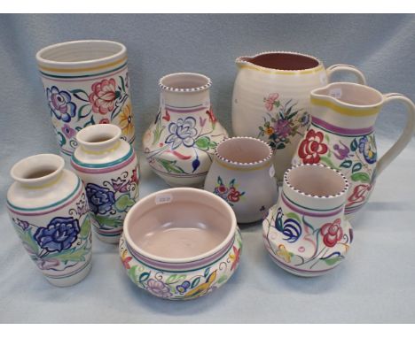 A COLLECTION OF POOLE POTTERY VASES  AND JUGS with 'traditional' decoration