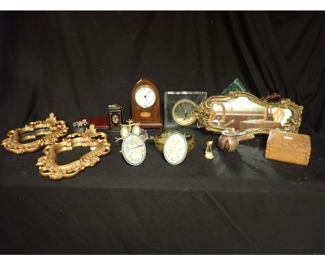AN EDWARDIAN MAHOGANY MANTEL CLOCK 21cm high, together with a modern mantel clock, gilt wood mirrors, a group of empty jewell