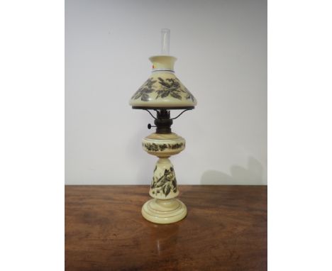 A VICTORIAN GLASS TABLE LAMP decorated with birds and flora, 58cm high