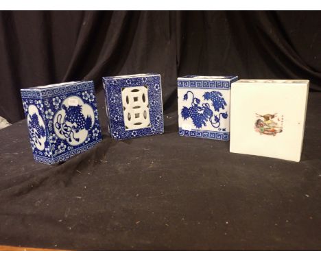 FOUR CHINESE FLOWER BRICKS, Late 19th/early 20th century, including an example decorated with figured in enamel and three blu