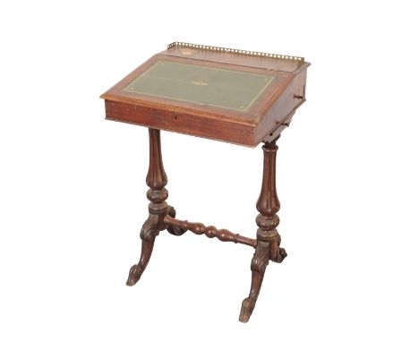 A VICTORIAN DAVENPORT stamped to the interior 'Wilkinson & Son, 8 Old Bond Street 7936', the galleried top above a leather wr