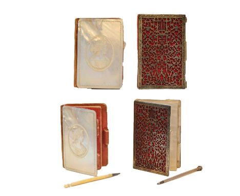 Two aide memoires, each oblong, one mounted in mother-of-pearl, the cover caved with an elegant lady, 8.5cm high, the other m
