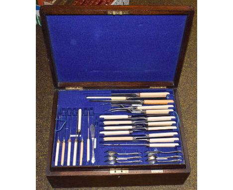 An early 20th century oak cased canteen of silver plated cutlery by Mappin &amp; Webb, housing three mostly complete trays