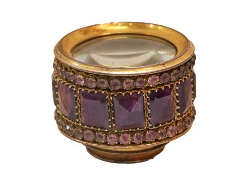 A 19th century paste set and gilt-metal spy-glass, the top set with amethyst coloured pastes, with six telescoping sections, 