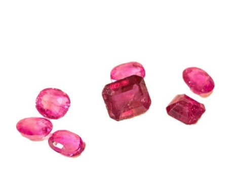 Five loose oval cut rubies, totalling 3.20 carat approximately; a loose octagonal cut ruby, weighing 1.65 carat approximately