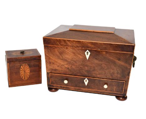A Regency inlaid mahogany workbox with ivory escutcheons, with brass loop handles and raised on squat bun feet, 30cm by 22cm 