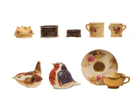 A Royal Worcester miniature tyg, mug bowl and rose pattern cup and saucer, two Royal Crown Derby paperweights, and two silver