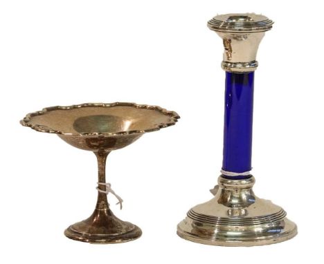 A Silver mounted blue glass candlestick, Birmingham, 1911 and a silver dish, by Mappin and Webb, London, 1914, with shaped ci