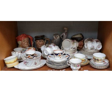 Royal Doulton character jugs, Royal Albert "Moss Rose" pattern cups and saucers, two Nao figures, Nao figures of a boy and ow