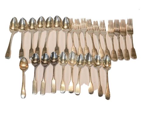 A George III and later silver table service, various maker's and dates, Fiddle pattern, some engraved with a crest, comprisin