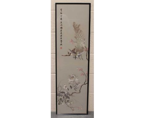 A Chinese silk embroidered rectangular panel, mid to late 20th century, finely worked in coloured threads with two peacocks f