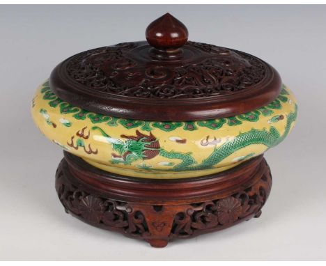 A Chinese famille verte enamelled biscuit porcelain circular bowl, mark of Kangxi but later Qing dynasty, the interior and ex