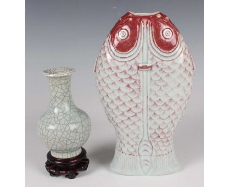 A Chinese Guan-type crackle glazed stoneware bottle vase, probably 20th century, the stout body and flared neck covered in a 