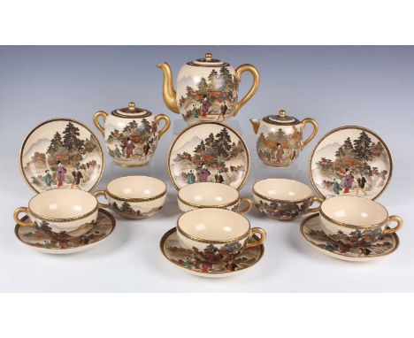 A Japanese Satsuma earthenware tea set by Shuzan, Meiji period, each piece painted and gilt with figures in landscapes, compr