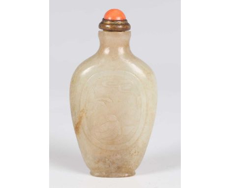 A Chinese small jade snuff bottle, Qing dynasty, of well-hollowed flattened ovoid form, each side carved in low relief with a