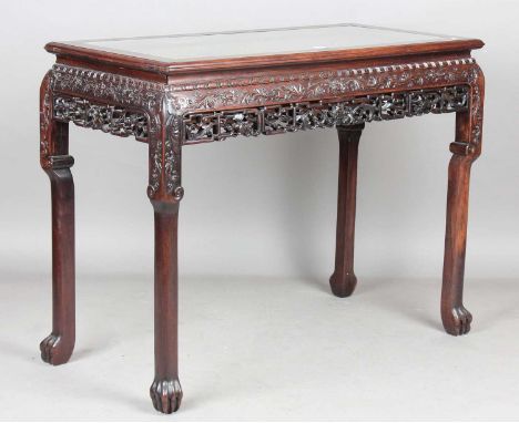 A Chinese hardwood rectangular table, late 19th century, the rectangular top inset with a glass panel to form a bijouterie/di