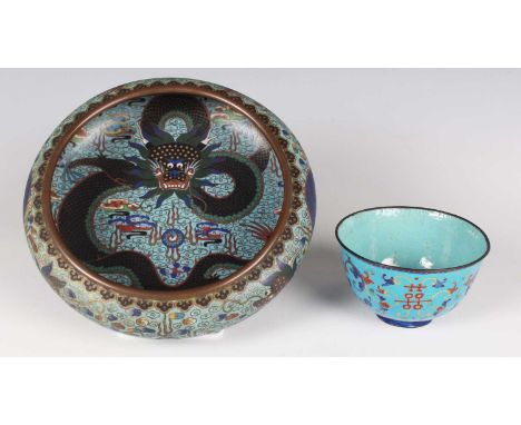 A Chinese Canton enamel circular bowl, 19th century, decorated in iron red, blue, green and gilt with a design of lotus, scro