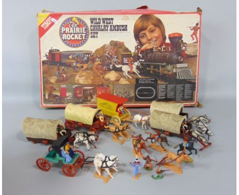 Timpo wild west theme toys including boxed 'The Prairie Rocket' train set, Dr Thaddeus Tripp horse and cart, five further hor