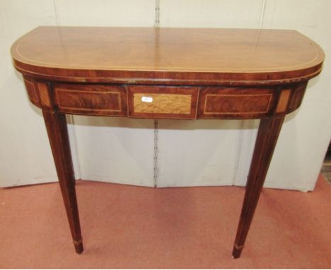 A Georgian mahogany D end fold over top card table, with satinwood and other banded detail raised on square tapered legs, 90c