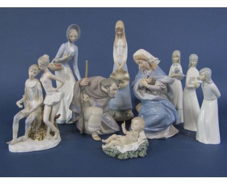 A three piece Lladro Daisa Nativity group comprising Virgin Mary, Joseph and The Child, together with further Spanish figures