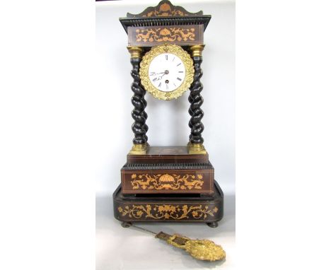 Inlaid marquetry French portico mantel clock by C. Detouche of Paris, the single train enamel dial framed by cast ormolu beze