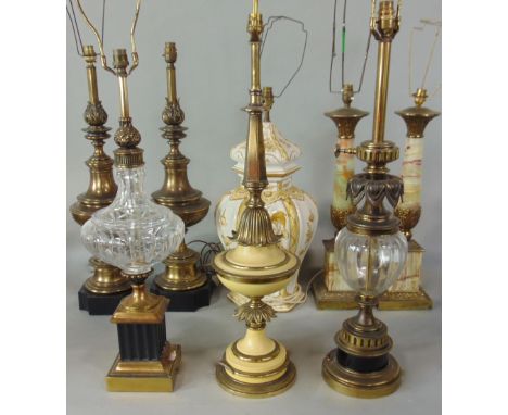 A good collection of mainly cast metal turned table/desk lamps, to include a pair with agate columns, a matching pair with ac