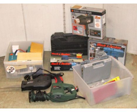 A workshop multi purpose power saw, various drill attachments, Black &amp; Decker sander, Black &amp; Decker hammer drill, et